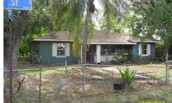 Large lot with a 3/1 single family home. Quiet loction. Located in Palm River area. Needs repairs, Code violations exist. Sold as-is with existing violations.