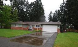 Adelaine Acres move in ready rambler in Tacoma. Neighborhood of ten quality built homes with real wood siding, newer roof, brick accents, large covered deck, large level acre lot, and outbuildings for storage. Inside you will love preparing meals in your