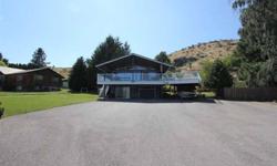 The perfect lake view home in prime location. 5-10 minutes to town, and within 2 miles of 5 different notable Lake Chelan Wineries. Many updates to the interior of the home include