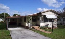 Don't want to spend a fortune to get your piece of the Sunshine State? Then consider this property. Located in Florida Trailer Estates, this clean & furnished mobile home has 2 bedrooms and 1 bath. The main living area has vaulted ceilings which makes