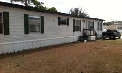 Mobile home with new roof and A/C. I will pay to move and set up, $35000 firm.