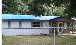 3 bedroom 2 bath, concrete block home with fenced in yard near Combee Rd and Lake Parker in Lakeland. This is a Fannie Mae HomePath property.