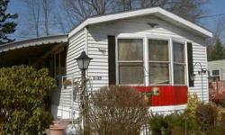 14 X 70 mobile home. 2 Large bedrooms with wall/wall closets, Front living room with room for desk area, bay windows facing south, great sun exposure in winter, aluminum siding, pitched roof (new last year), regular storm windows, easy to heat. new hot