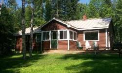 271 RANGELEY MANOR. Steps from sandy beach access on Rangeley Lake. This 3 bdr, 2 bath cottage has many updates including kitchen, mudroom, master bedroom & 28x32 garage. Property in perfect condition. Great rental potential all 4 seasons. Great