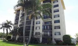 Beautiful partially furnished corner condo with Fantastic views of Lake Grassy and beyond from the 4th floor.Appliance's are new.Library on 5th floor, laundry room and storage.$25.00 per year gives you access to the beautiful Sun n Lakes Park,Clubhouse