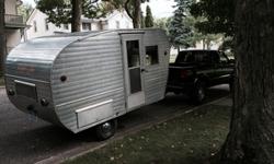 1959 Easy Travler Trailer, Road ready, easy to tow12 foot. Recently replaced bearings and re-packed wheels on the trailer.Original wood interior, propane cooktop included as well as ice box, 6' interior, Exterior Door