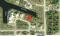 Oversized Waterfront lot with Gulf Access via South Gulf Cove lock system. The bridge to go under is about 10 feet high. Great Homes on this street. The owner owns 9 other lots and 6 of them are waterfront. South Gulf Cove is a deed restricted