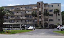 Move in ready 1/1 condo on fourth floor of Ironwood Condominiums. No age restrictions. Elevator access. Spacious living room. separate dining area. Freshly painted. New refrigerator. Enclosed lanai. Owner installed impact film on kitchen, living, and