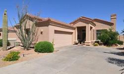 The combination of a remodeled home with stunning views make this home a winner. N/S lot w/ S. facing backyard provides breathtaking views of the McDowell Mts., Four Peaks, & Troon Mt.! Borders Natural Area Open Space. Kitchen w/ slab granite counters