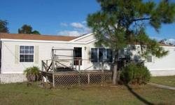 2 x 6 construction, thermopane windows, Just across the street from Redwater Lake boat public boat ramp. 2003 Manufactured home. Split floor plan, family room just off the kitchen and dining room. Nice floor plan. Needs some TLC. Owner had shared the well
