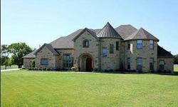 Custom 6 bedrooms, four bathrooms, media rm, exercise rm, and study, custom old world inspired home in the exclusive gated oaks of buffalo way on 1.39 acre homesite.
Karen Richards is showing 5090 Bear Claw Ln in Rockwall, TX which has 6 bedrooms / 4.5