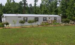 Extra nice 3 bedroom, 2 full bath mobile home. Private setting on 6+/- acres, creek along back of property, nicely landscaped, plenty of garden space.
Listing originally posted at http