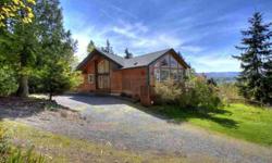 Your own private retreat! Custom built cedar home on almost 3 ac w/ Mnt. & valley views. Very spacious, open flr plan w/vaulted ceilings & walls of windows. Huge gourmet kit w/Viking appl, walk in pantry & beautiful butcher blck island. Great dck off the