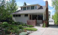 Downtown Bozeman Charmer. Updated home with 5B/3B + office + theater room. Enjoy beautiful hardwood floors, large picture windows, open floor plan, wood stove, new tiled kitchen/bathrooms. Spacious master suite w/ tiled walk-in shower, wood stove, great