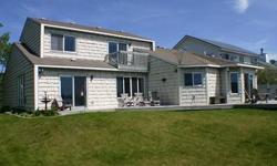 The perfect beach house in an ideal Park Point location. Located on a quiet cul-de-sac and abutting acres of county land, this stunning 3 bdrm, 3 bath beach house was designed with entertaining in mind. One large and sunny room leads to the next and all