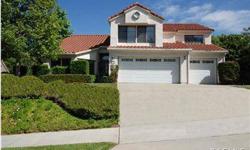 Beautiful two level home in the sierra la verne access controlled community with very nice curb appeal*desirable main floor master bedroom*spacious master bedroom offers a master bath with separate bathtub and shower and his and her sinks*floorplan offers