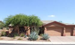 Extraordinary lot over 1/3 acre and backing the NAOS with mountain views to the east. Property is located in manicured North Scottsdale neighborhood in desirable elementry school district - location location location! You'll be greeted by a beautiful tall