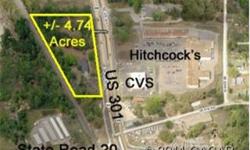 Fantastic commercially-zoned parcel with over 740 feet of frontage on US HWY 301 directly across from the Hitchcock's shopping center. There is currently a structure on the property that would need to be removed. This is a $150,000 price reduction from