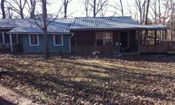 FOR SALE, 2 or 3 bedroom w/ 2 baths located between Edgar Springs MO and Highway J. Beautiful home sits on 2 1/2 acres, completely fenced, with several outside bulidings that have electic and water to most. Very large pond (lake) in backyard, fully