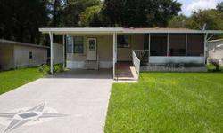 This well maintained double wide mobile home has 2 bedrooms, 2 baths, with a large family room and screened porch.Listing originally posted at http