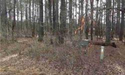 Mixed woods on this gently sloping 2.39 acre lot minutes to Carrboro. Call CSS to register to show. Thanks