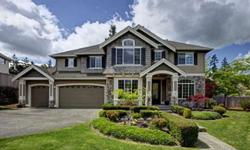 stunning custom built home by david james, inc. in the in the highly desired neighborhood of cascade view in snoqualmie ridge. flawless floor plan, offers 3600 sq. ft. with gourmet kitchen, custom dual staircase, 4 bedrooms, 2.50 baths, sunken bonus room