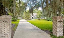 First time offered! This custom built, one owner Country French Estate sits tucked away on nearly one acre showcasing breathtaking views and spectacular sunsets on over 162 feet of direct frontage on Lake Dora. Exuding sophistication and special comfort
