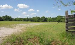 2.4 +/- Acres Country Setting Close To Town. Corner Property With Some Tree Clusters. Utilities