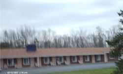 Lovely Motel & Campsite w/updated rooms & furniture, each room has a refrigerator, all rooms have microwave. Campsite has 29 sites w/elec., water & sewer. Plus owner has double w/3 BDRRM. up & 3 BDRM. down. One room has jacuzzi, new roof on double and