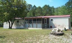 Well-maintained 14x80 palm harbor, three bd, two bathrooms on .50-/+, (3 lots) exterior features includes freshly painted siding with new skirting, new metal roof in 2011, new 2 1/2 ton hvac, new double hung windows, new 12x14 screened front porch with a