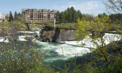 Spectacular main level unit at the Upper Falls Condominium with breathtaking views of the Spokane River and the cascading falls. Impeccable condition, open floor plan, 3 bedrooms, 3 baths plus office area and more. 2 level deck, 2 parking spots, 4 years