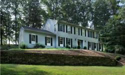 Gracious Center Hall Colonial set well back front the road on 2+ acres for privacy & serenity. Thoughtfully designed with gleaming hardwood floors, spacious floor plan & Kitchen with Breakfast area. Nestled among mature trees and very close to the State