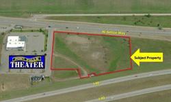 High visibility 5.75 acre development property located adjacent to Seltice Way and I-90 in Post Falls. This parcel is zoned Industrial with all services available. Located next to the Post Falls Cinemas and across the street from Kimball Manufacturing.