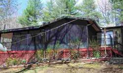 This 2/2 with large Garage Home set's up above the creeks on 2.65 Acres,The home has large Porch's for your out door fun and cook outs,And Yes room for a Garden also.It has a hook up for your RV. And would make a Great Vacation Home or full time Home. The