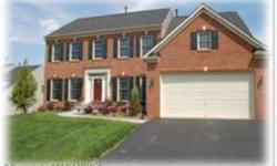 Immaculate brick front 5 bdrm 4 1/2 baths w/1st floor office. Hrdwds, C-tile, crown molding, columns, 9ft ceilings & tray ceilings. Awesome lower level w/media rm, bdrm, full bath & full wet bar w/frig, dishwasher,& sink - could be in-law suite. Beautiful