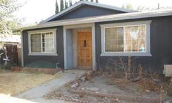 3 bed 2 bath in Clovis - NEEDS TONS OF WORK! MUST SELL!!Could be a great property to fix and flip or even a possible rentalProperty is in desperate need of new carpet and paint.There is most likely mold in the kitchen.Please call me for more details.Raul