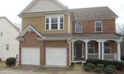 Formal living and formal dining area, open foyer entrance with hardwood floors, family room with fireplace. Kitchen with corian counter top, pantry, built in microwave and breakfast area, rear deck. Master bedroom with garden tub, separate shower and dual