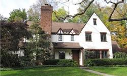 Enchanting sun drenched Collet-built Tudor in Fox Meadow on .51 acres of gorgeous grounds with complete privacy. Five bedrooms. Three full baths and a powder room. Cook's kitchen with a large center island, desk, top appliances and a fabulous family