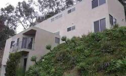 This light and bright modern bi-level home offers the discriminating dweller an upscale quiet hideaway on the east side of Silver Lake. Two-fireplaces, high-end appliances and just moments away from Downtown, major studios and some of the finest and